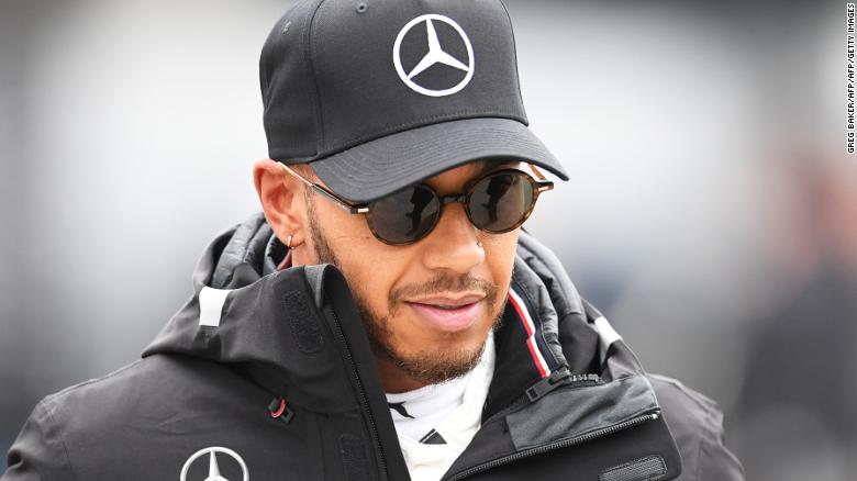 Mercedes&#39; British driver Lewis Hamilton walks in the paddock after practice for the Formula One Chinese Grand Prix in Shanghai on April 13, 2018. / AFP PHOTO / GREG BAKER (Photo credit should read GREG BAKER/AFP/Getty Images)