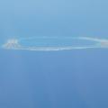 The Chinese-controlled artificial island of Subi Reef in the South China Sea, as seen by CNN from a US reconnaissance plane on August 10.